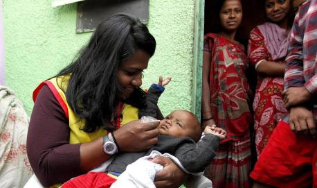 Minda vaccinating in India