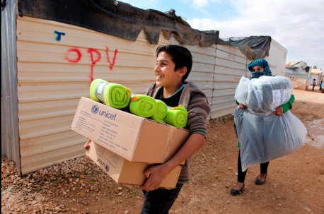 Person Carrying UNICEF Supplies