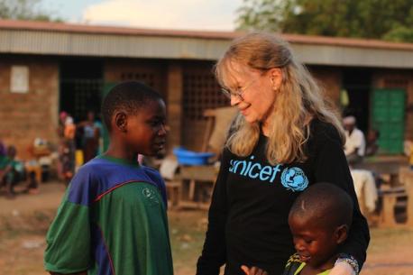 UNICEF Worker with Two Boys